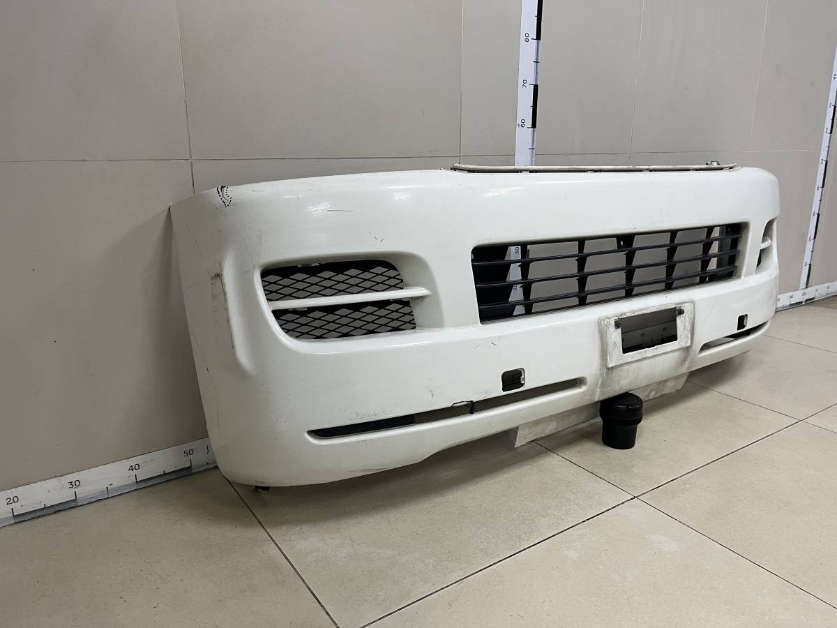 Бампер передний Toyota Hiace H200 2005-2015