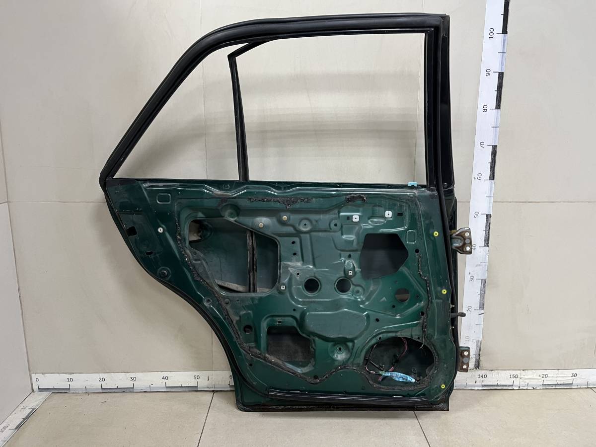 Дверь задняя левая Mazda Capella (GF, GW) 1997-2002