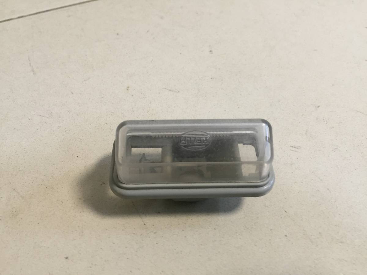 Фонарь подсветки номера Toyota Avensis (T250) 2003-2009