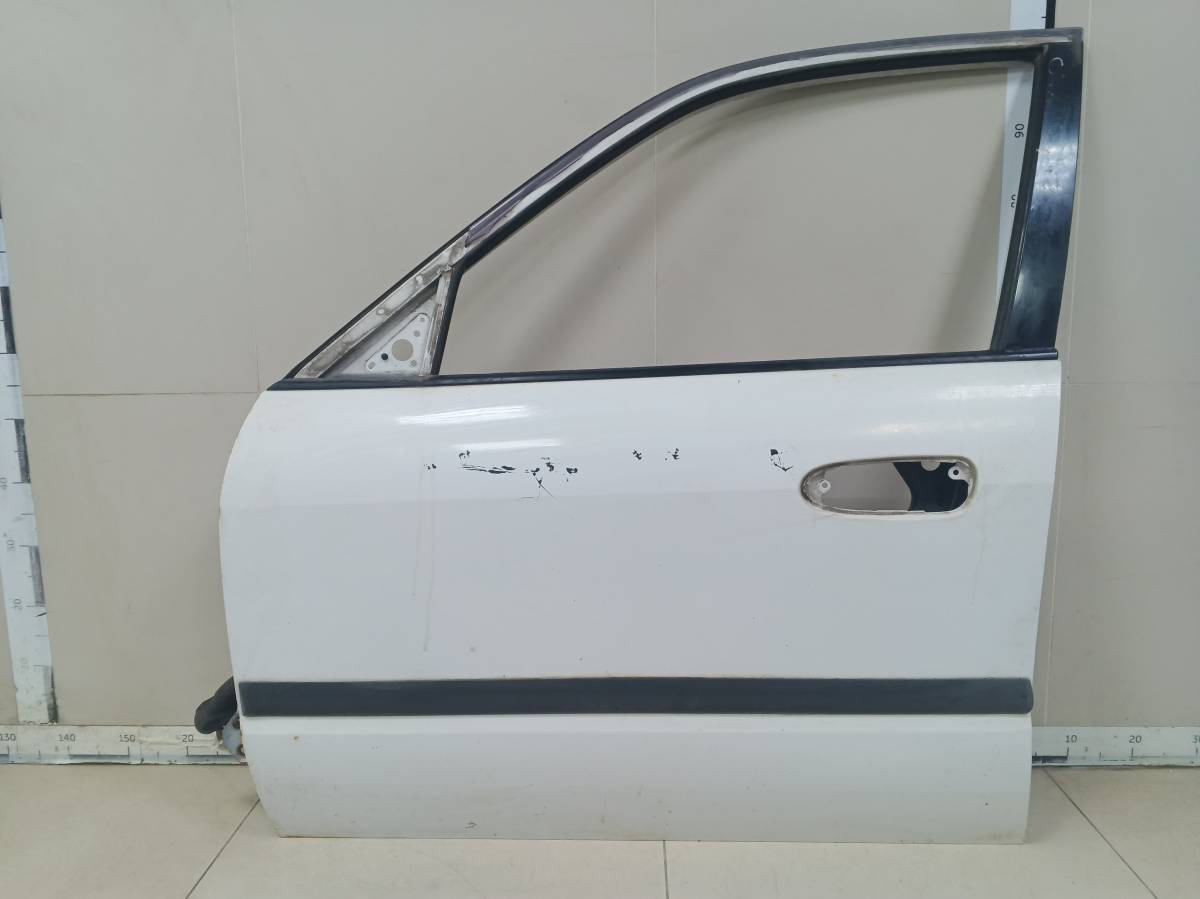 Дверь передняя левая Mazda Capella (GF, GW) 1997-2002