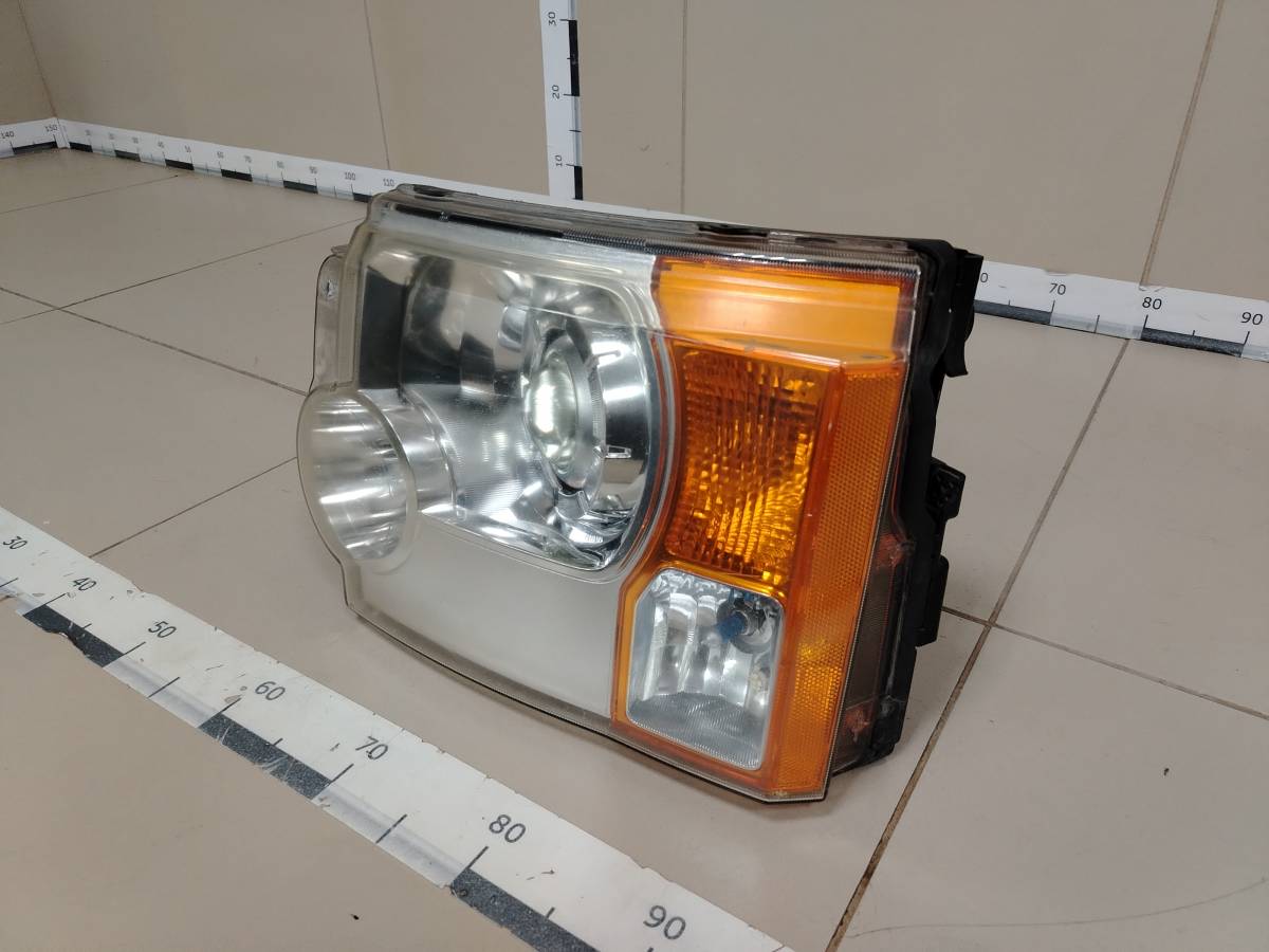 Фара левая Land Rover Discovery 3 2004-2009