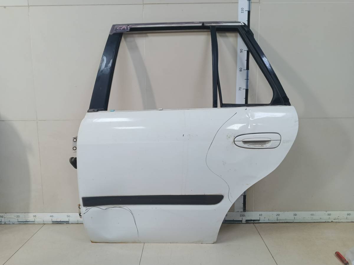 Дверь задняя левая Mazda Capella (GF, GW) 1997-2002