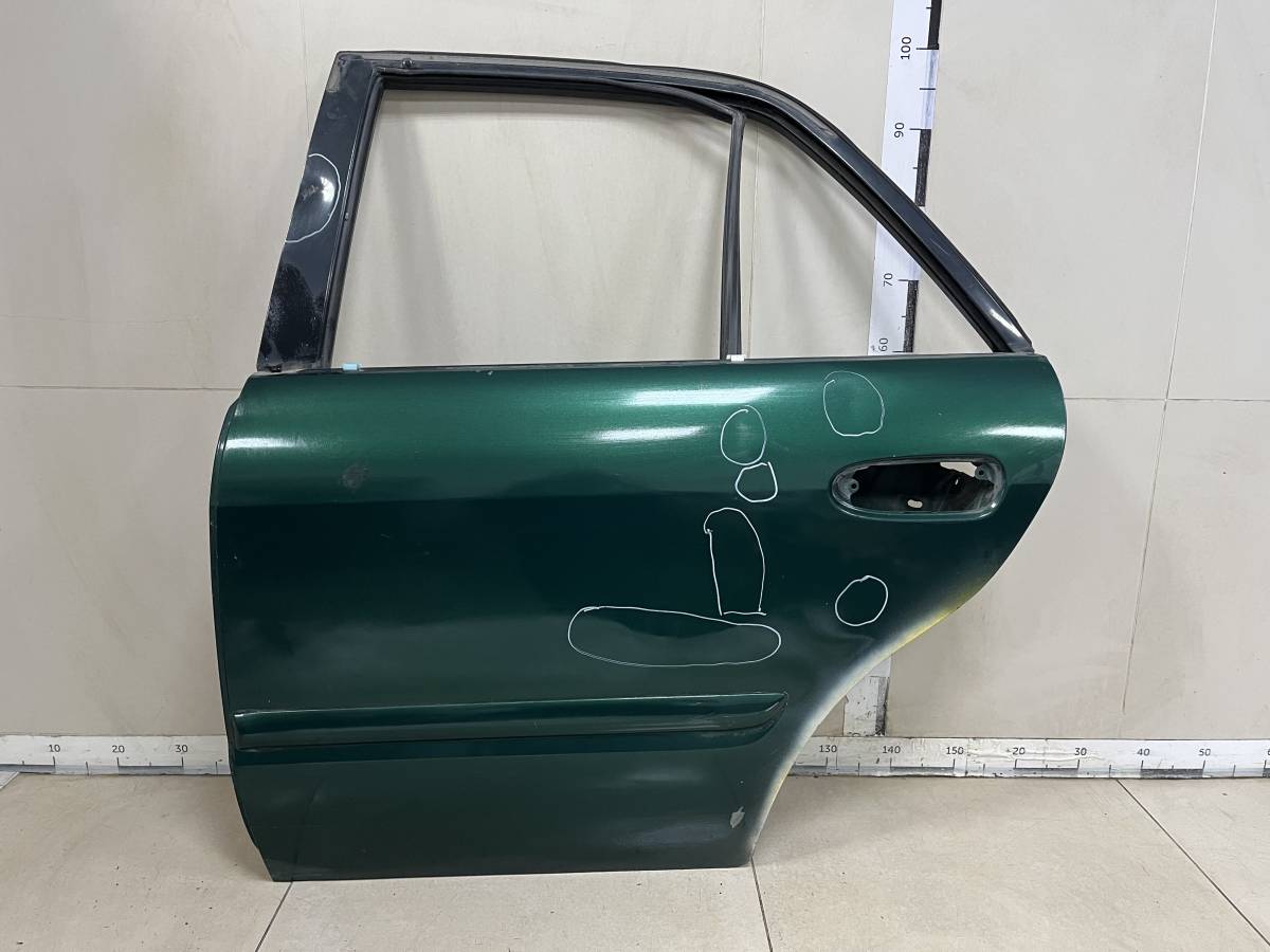 Дверь задняя левая Mazda Capella (GF, GW) 1997-2002