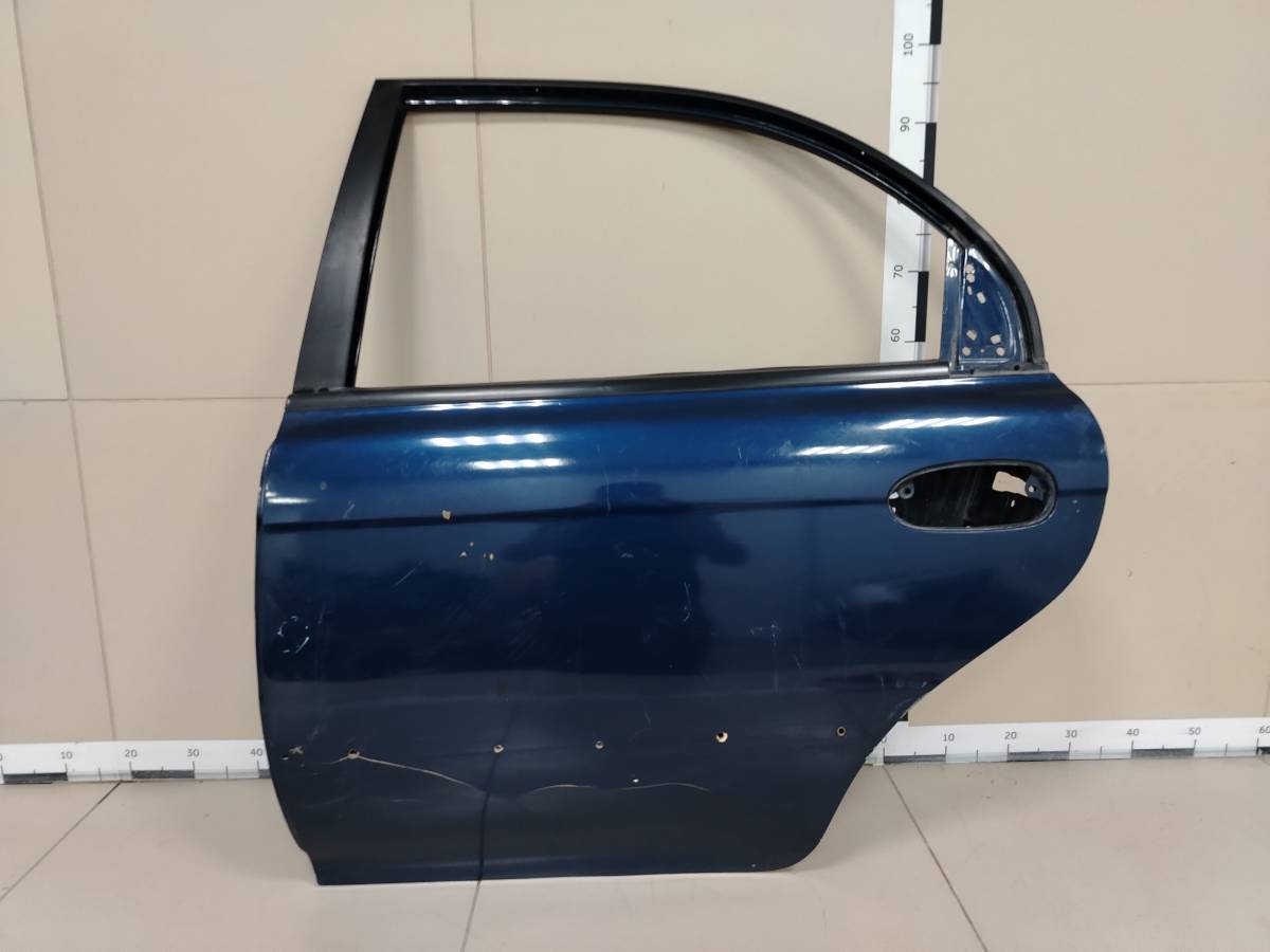 Дверь задняя левая Kia Spectra 2001-2011