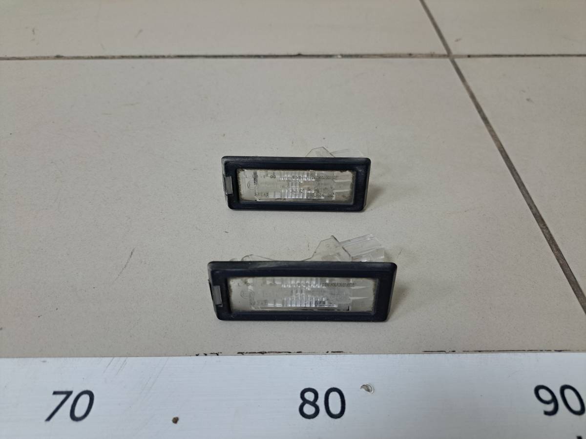 Фонарь подсветки номера Renault Duster 2012> Фонарь подсветки номера Renault Duster 2012>