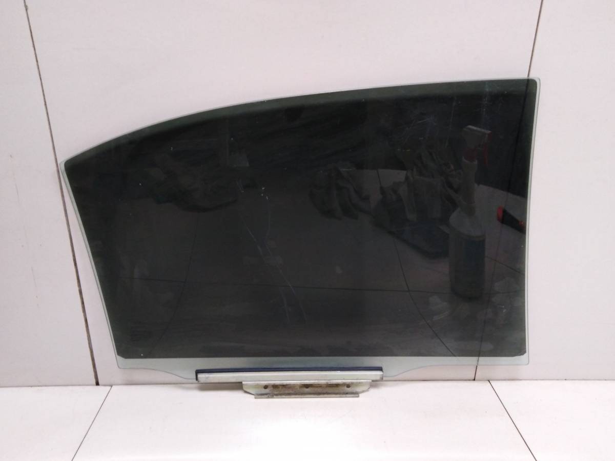 Стекло двери задней левой Toyota Avensis (T250) 2003-2009