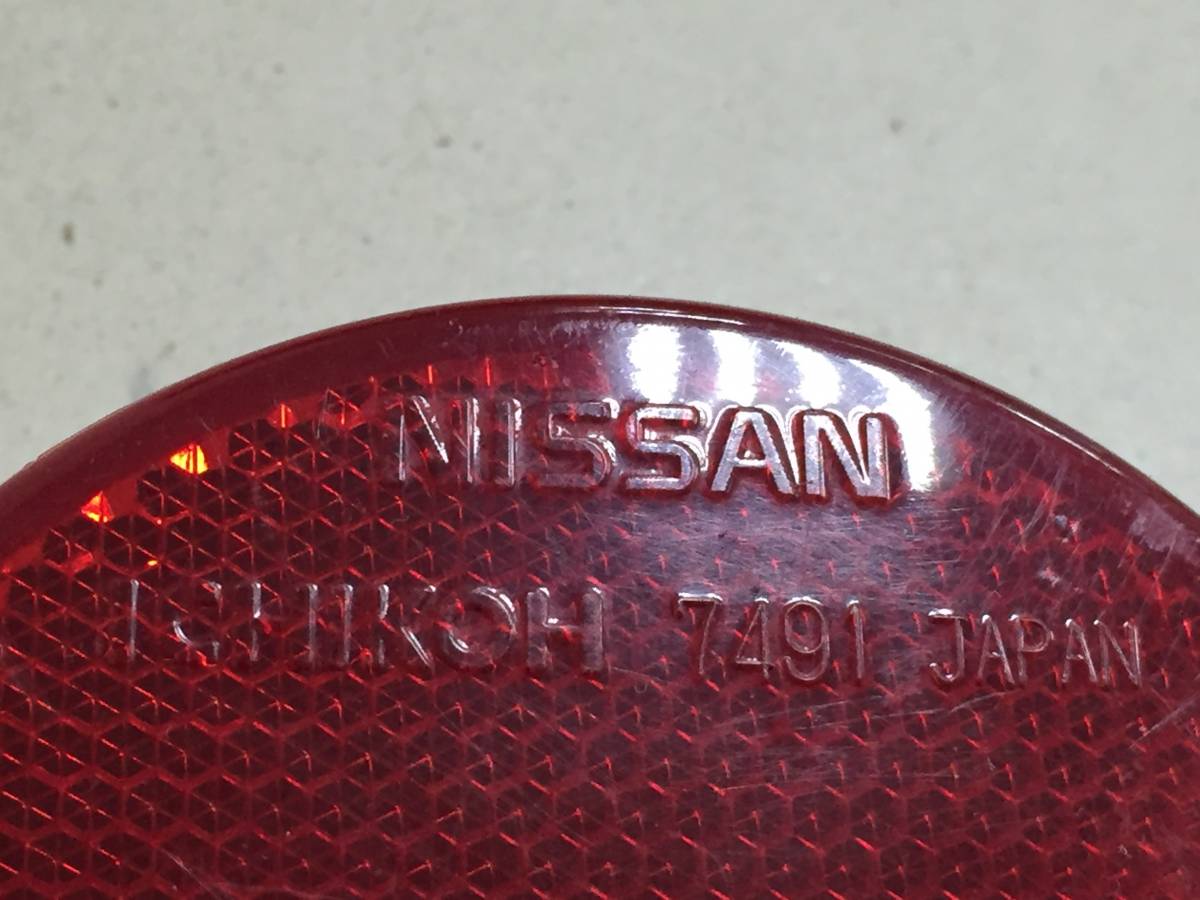 Отражатель в бампер задний левый Nissan X-Trail (T31) 2007-2014