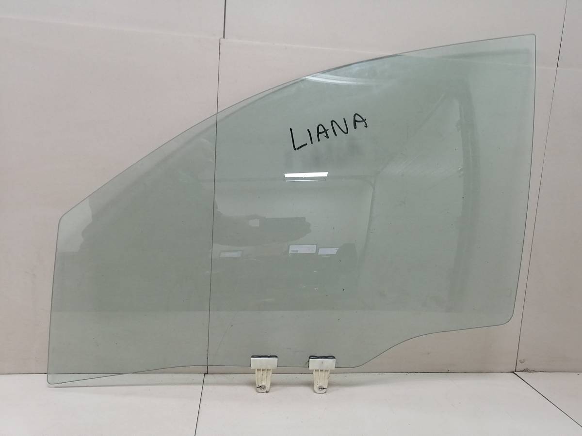 Стекло двери передней левой Suzuki Liana 2001-2007