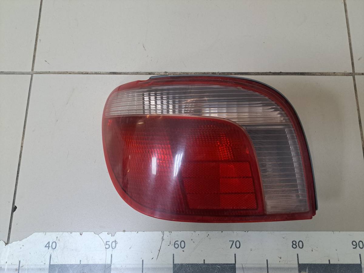 Фонарь задний левый Toyota Vitz (P10) 1999-2005