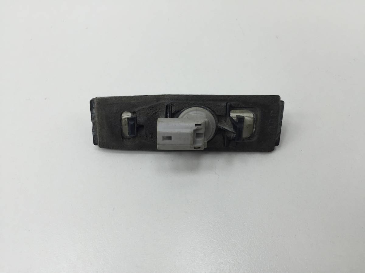Фонарь подсветки номера Toyota Camry (V40) 2006-2011