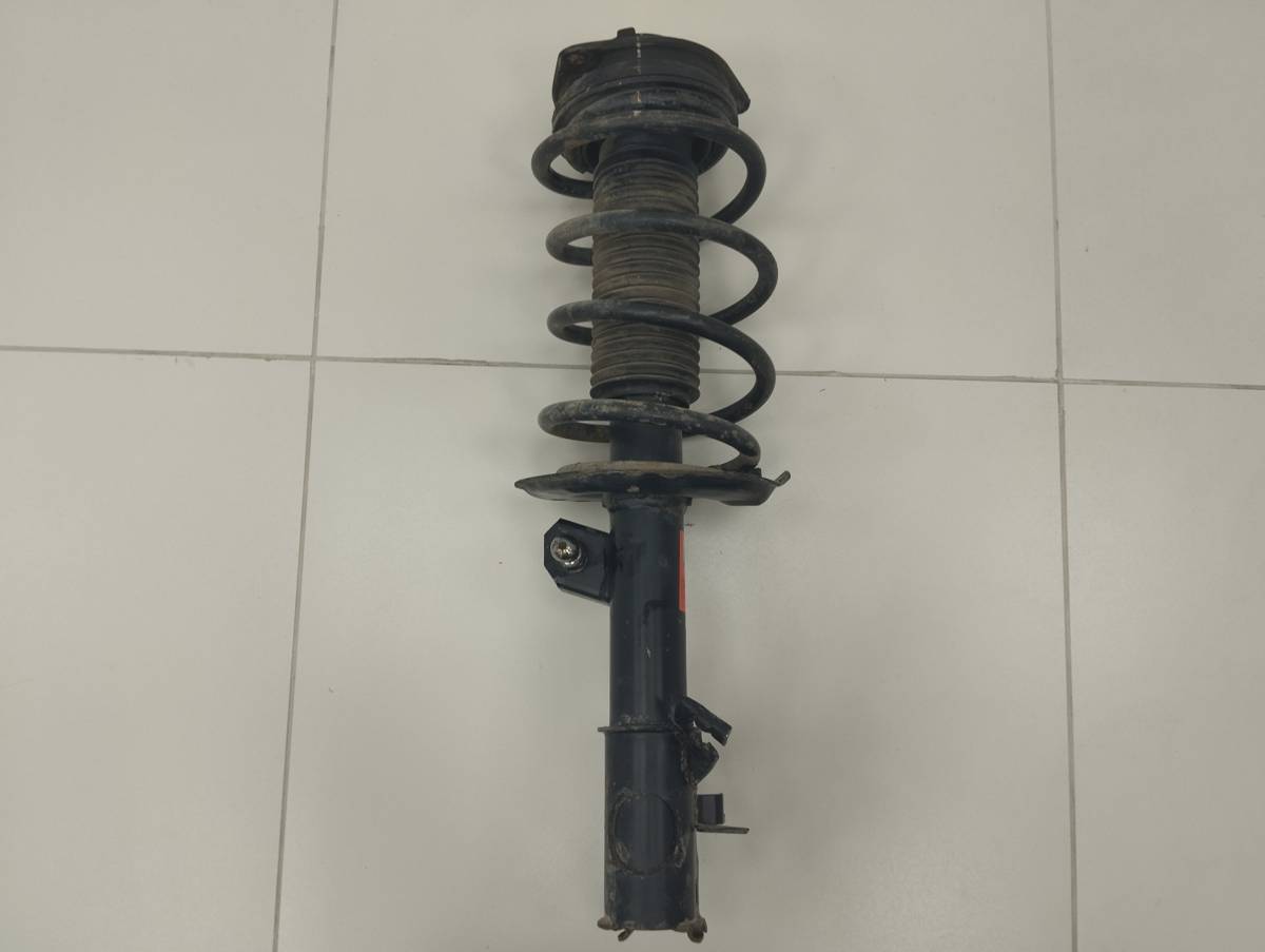 Амортизатор передний левый Nissan Qashqai (J10) 2006-2013