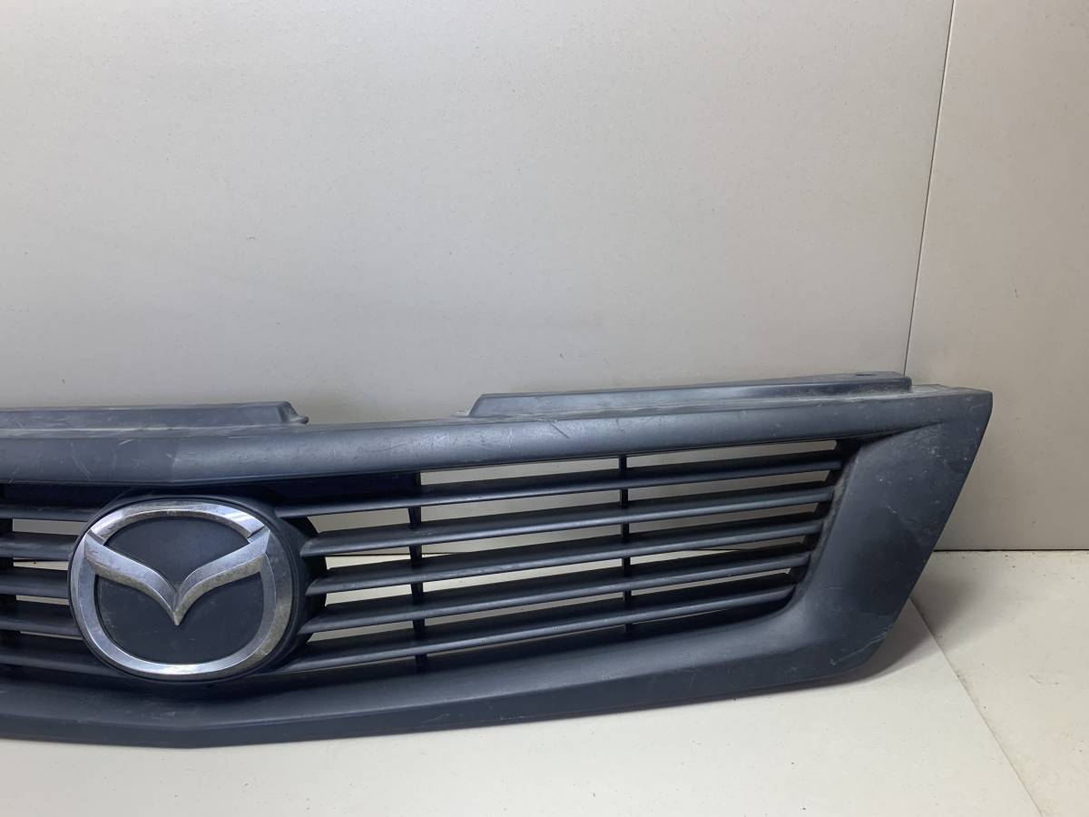 Решетка радиатора Mazda Familia (BJ) 1998-2003