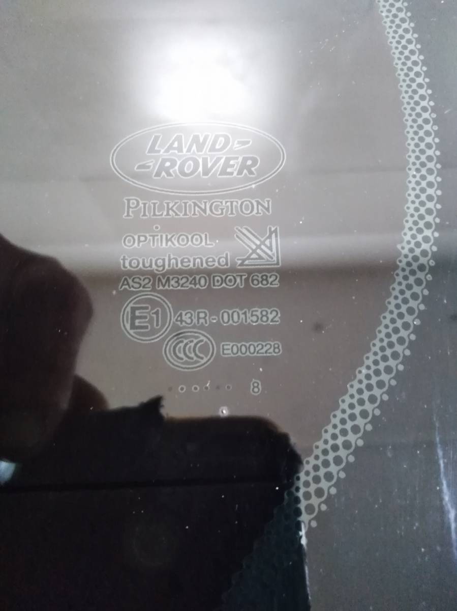 Стекло кузовное глухое левое Land Rover Discovery 3 2004-2009