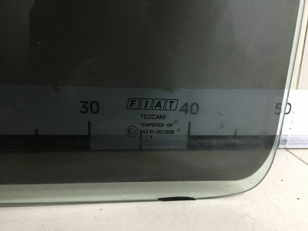 Стекло двери задней левой Fiat Doblo (223) 2005-2015