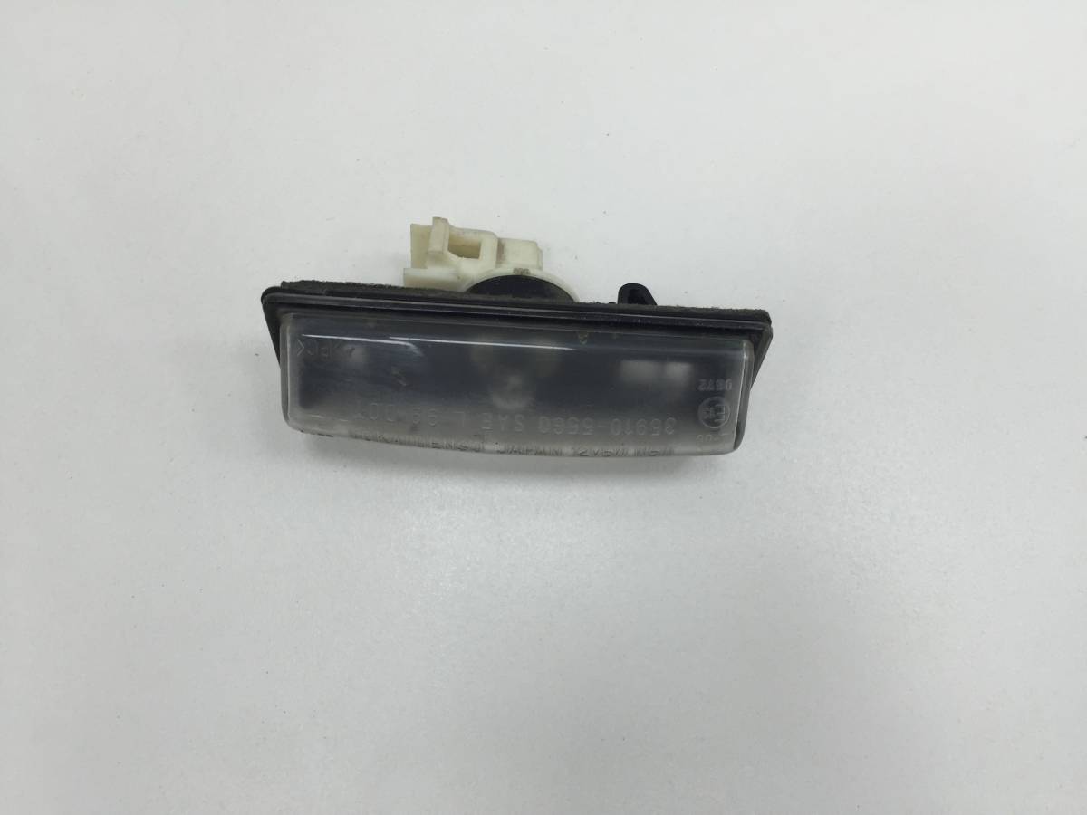 Фонарь подсветки номера Suzuki SX4 2006-2013