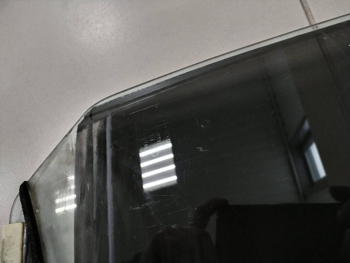 Стекло двери задней правой Nissan Sunny (B15) 1998-2004