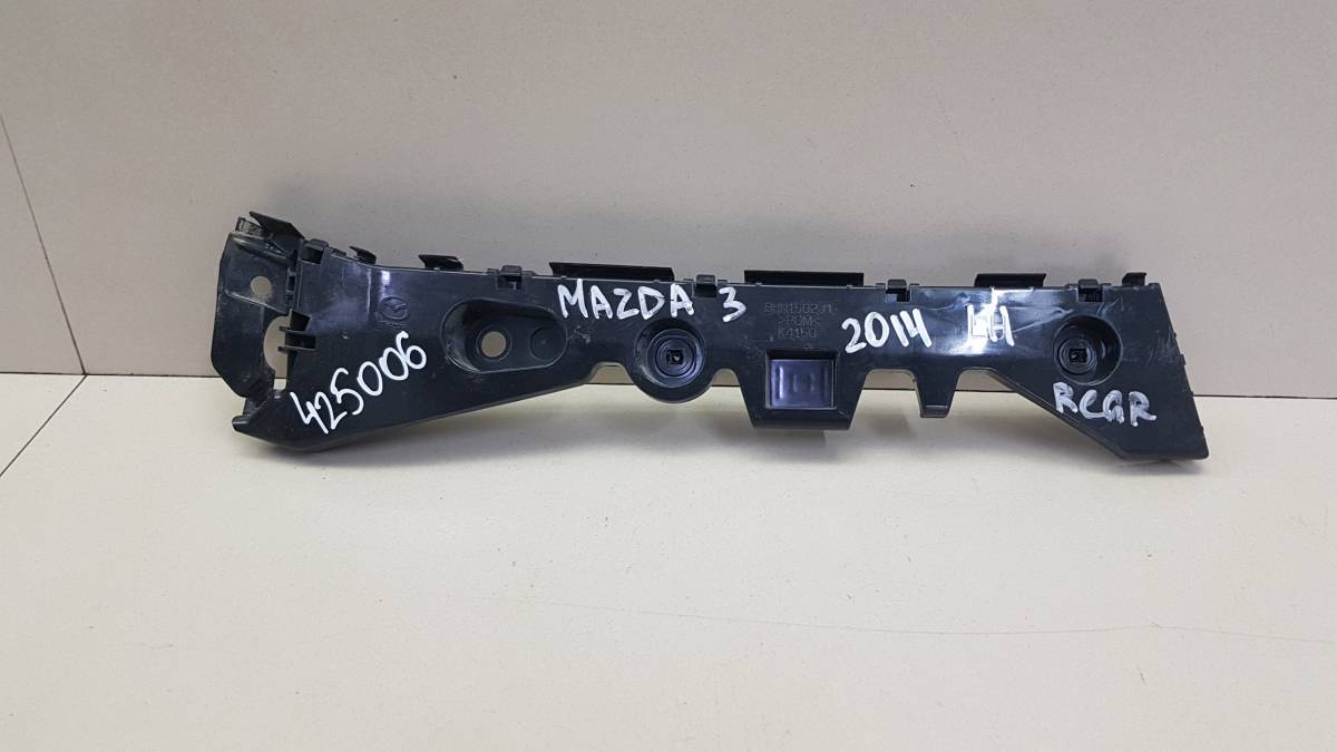 Кронштейн заднего бампера левый Mazda Mazda 3 (BM) 2013-2016