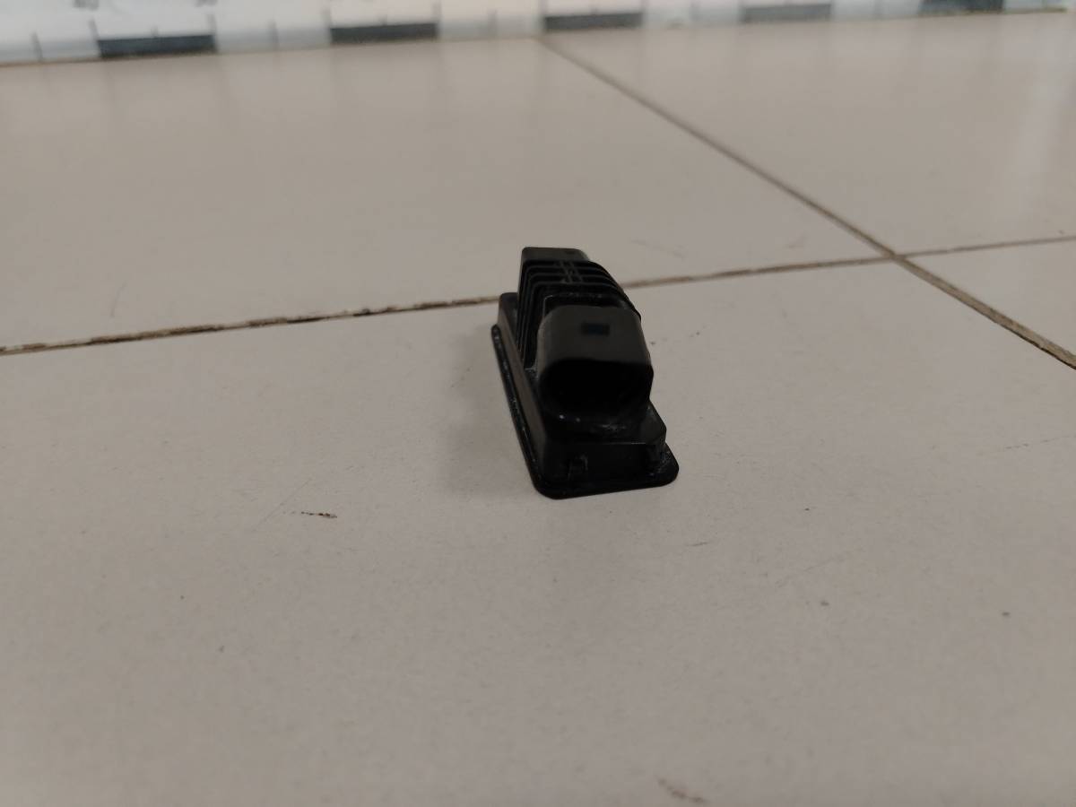 Фонарь подсветки номера Volkswagen Passat B6 2005-2010