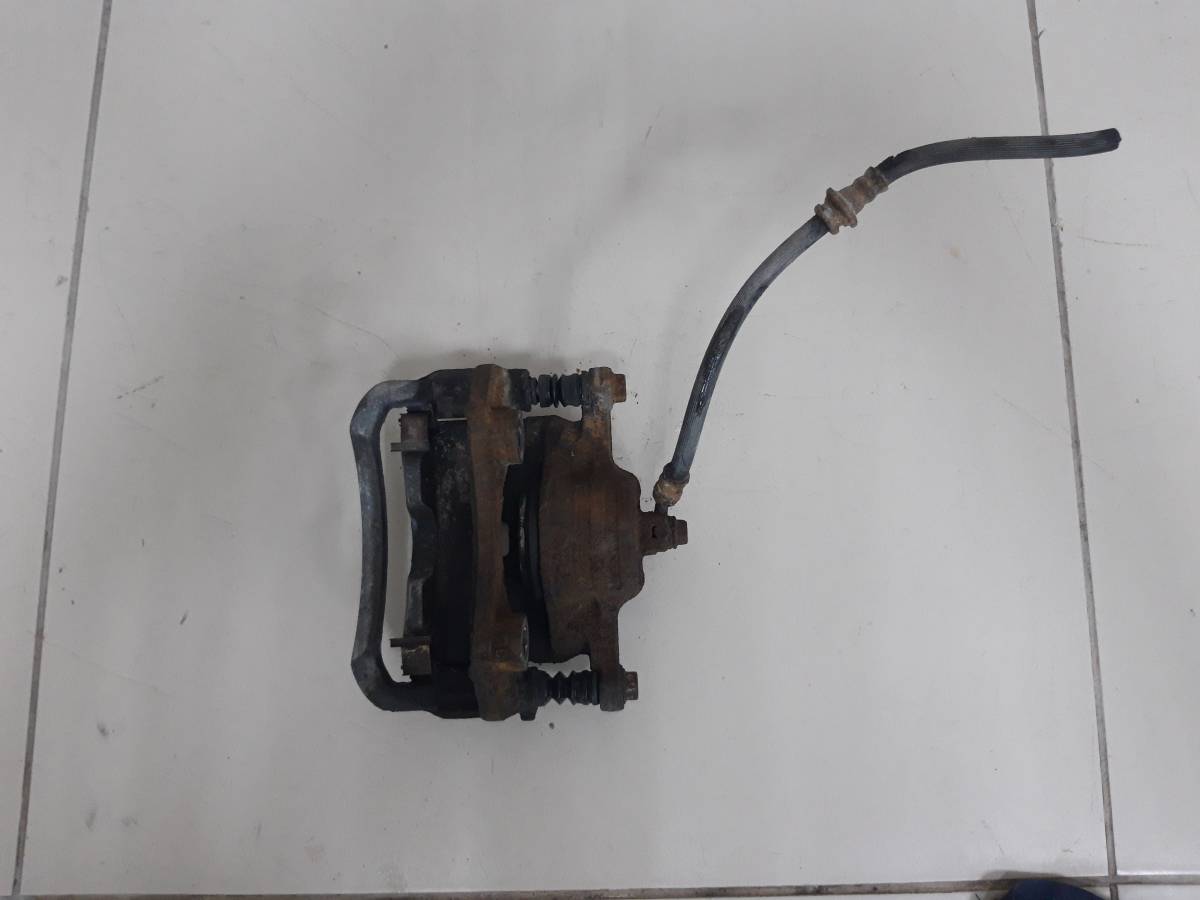 Суппорт передний левый Nissan Almera Classic (B10) 2006-2013