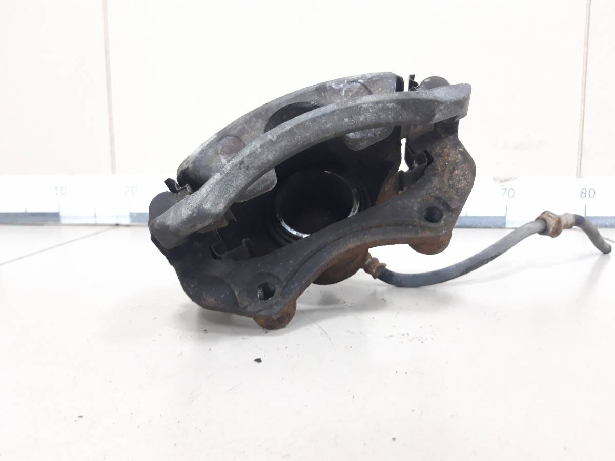 Суппорт передний левый Nissan Almera Classic (B10) 2006-2013