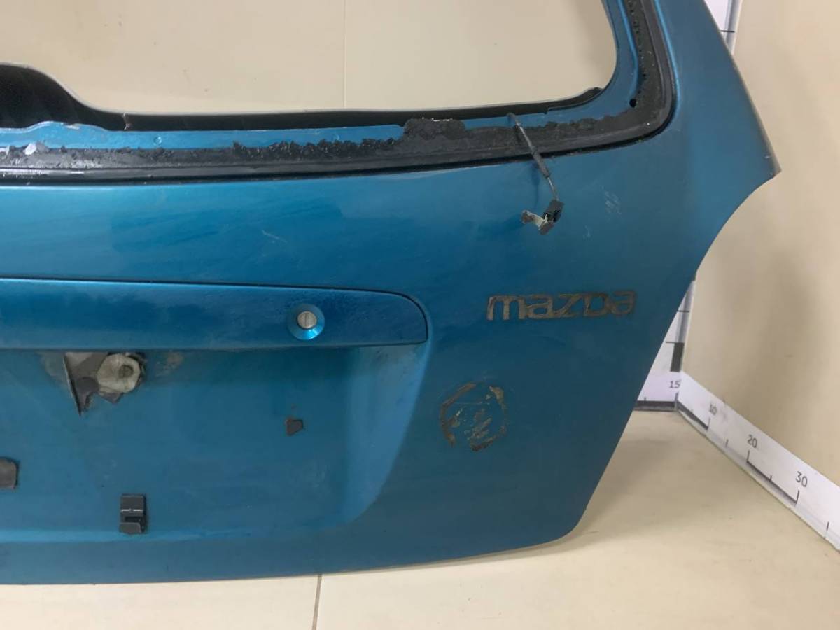 Дверь багажника Mazda Familia (BJ) 1998-2003