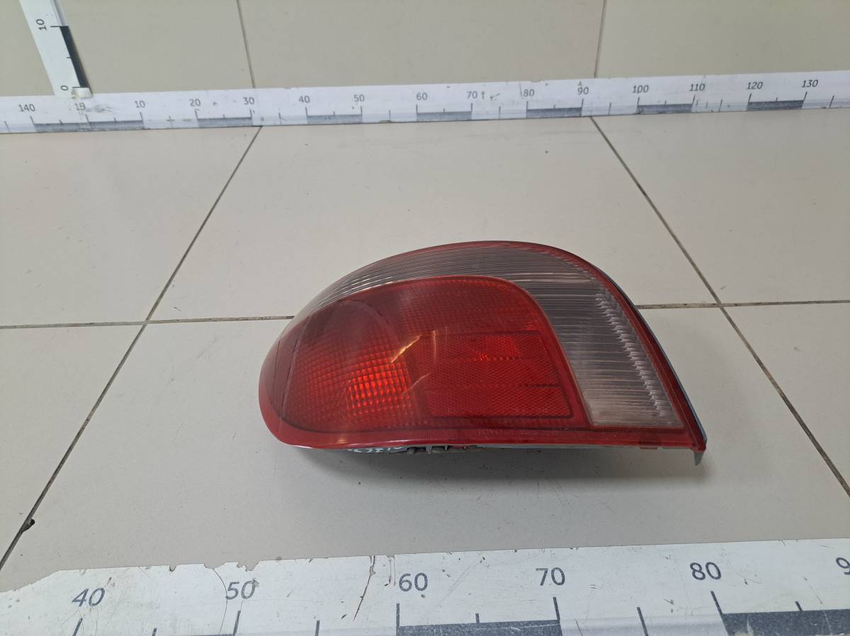 Фонарь задний левый Toyota Vitz (P10) 1999-2005