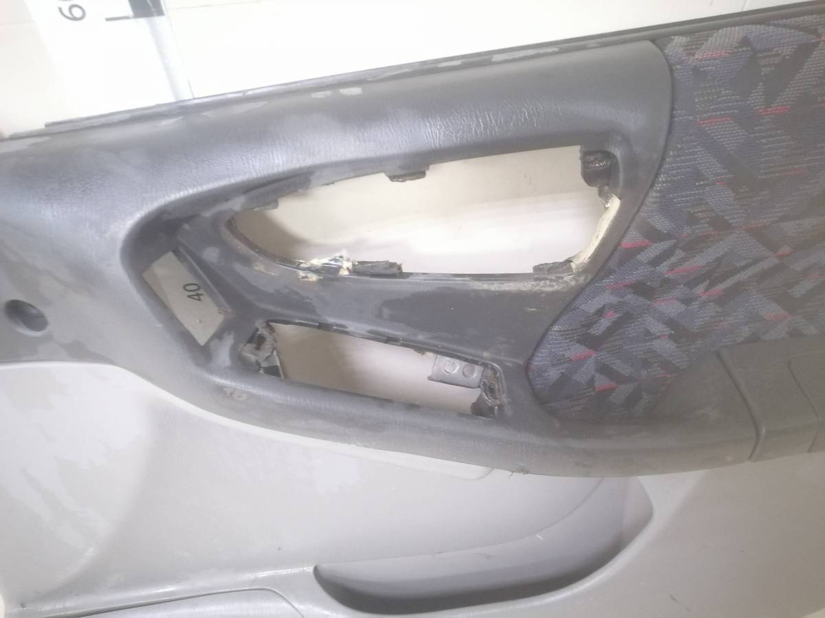 Обшивка двери передней правой Subaru Forester (S10) 1997-2000