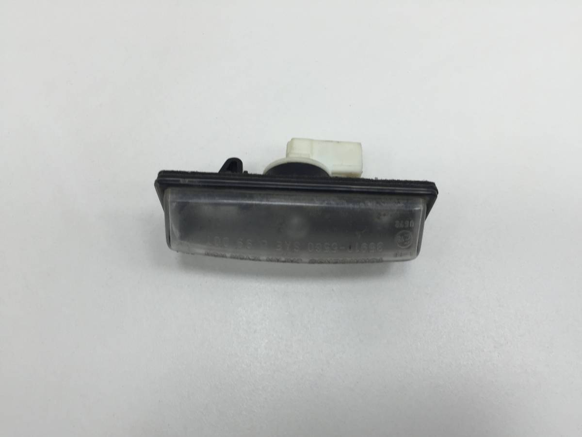 Фонарь подсветки номера Suzuki SX4 2006-2013