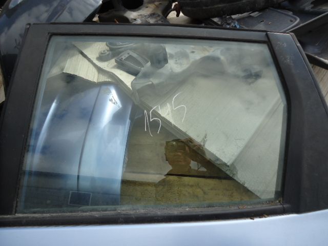 Стекло двери задней левой для Honda Fit (GD1) 2001-2007