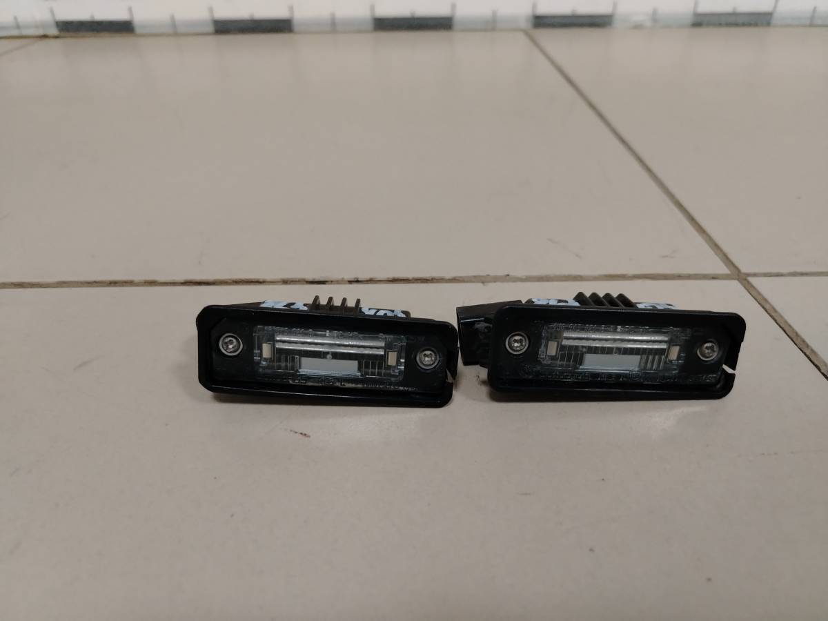 Фонарь подсветки номера Volkswagen Passat B6 2005-2010